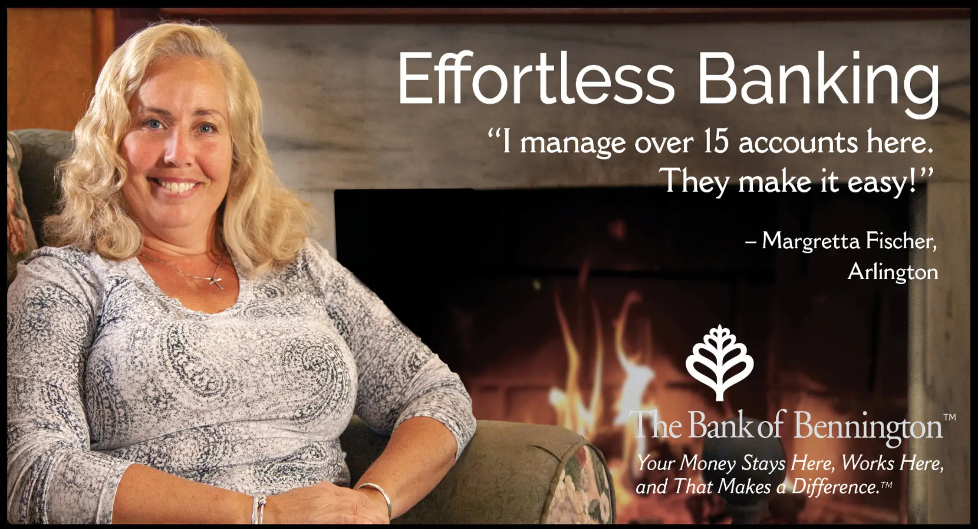 A woman sitting in front of a fireplace.